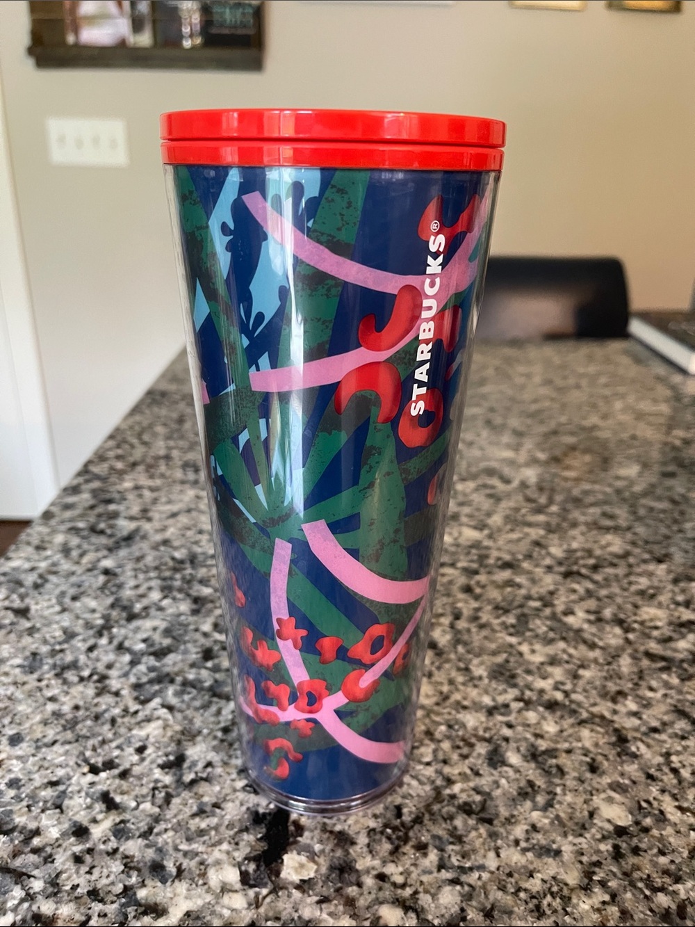 Starbucks Navy Tumbler with Red Lid and Pink-Green Floral Design